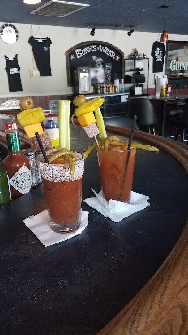 Drinks on a bar near warm wood finishes.